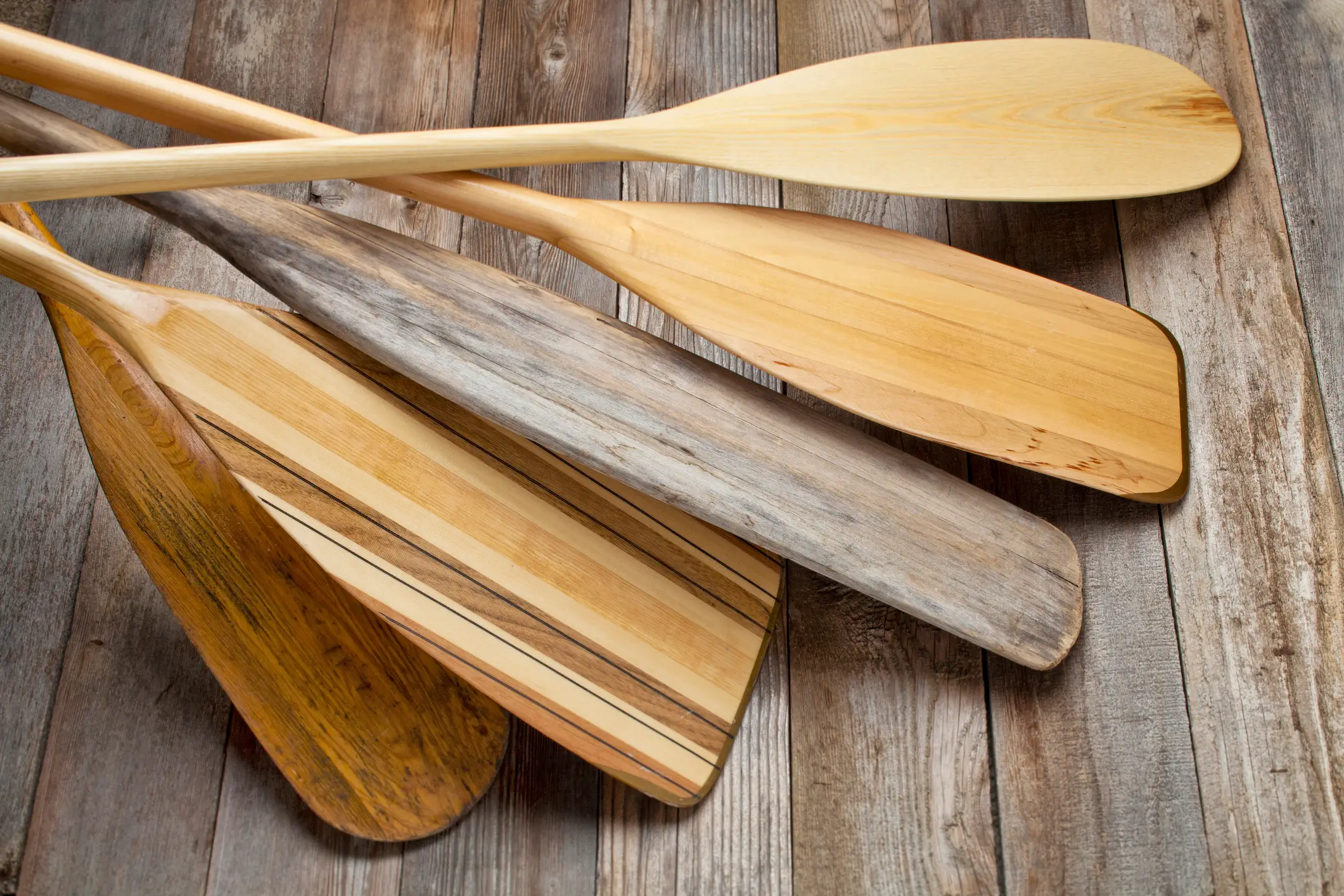 Several wooden paddles